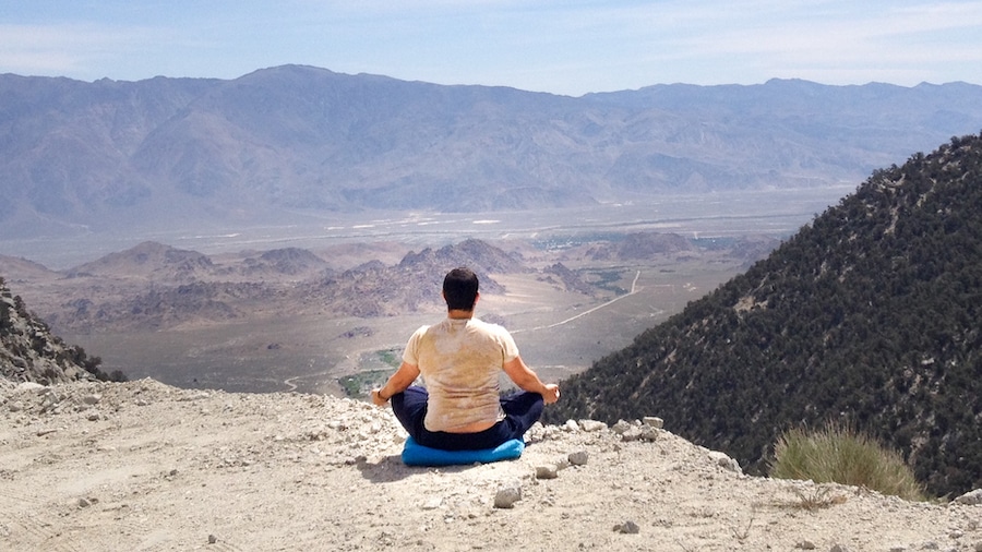 Kevin Ellerton meditating in the desert
